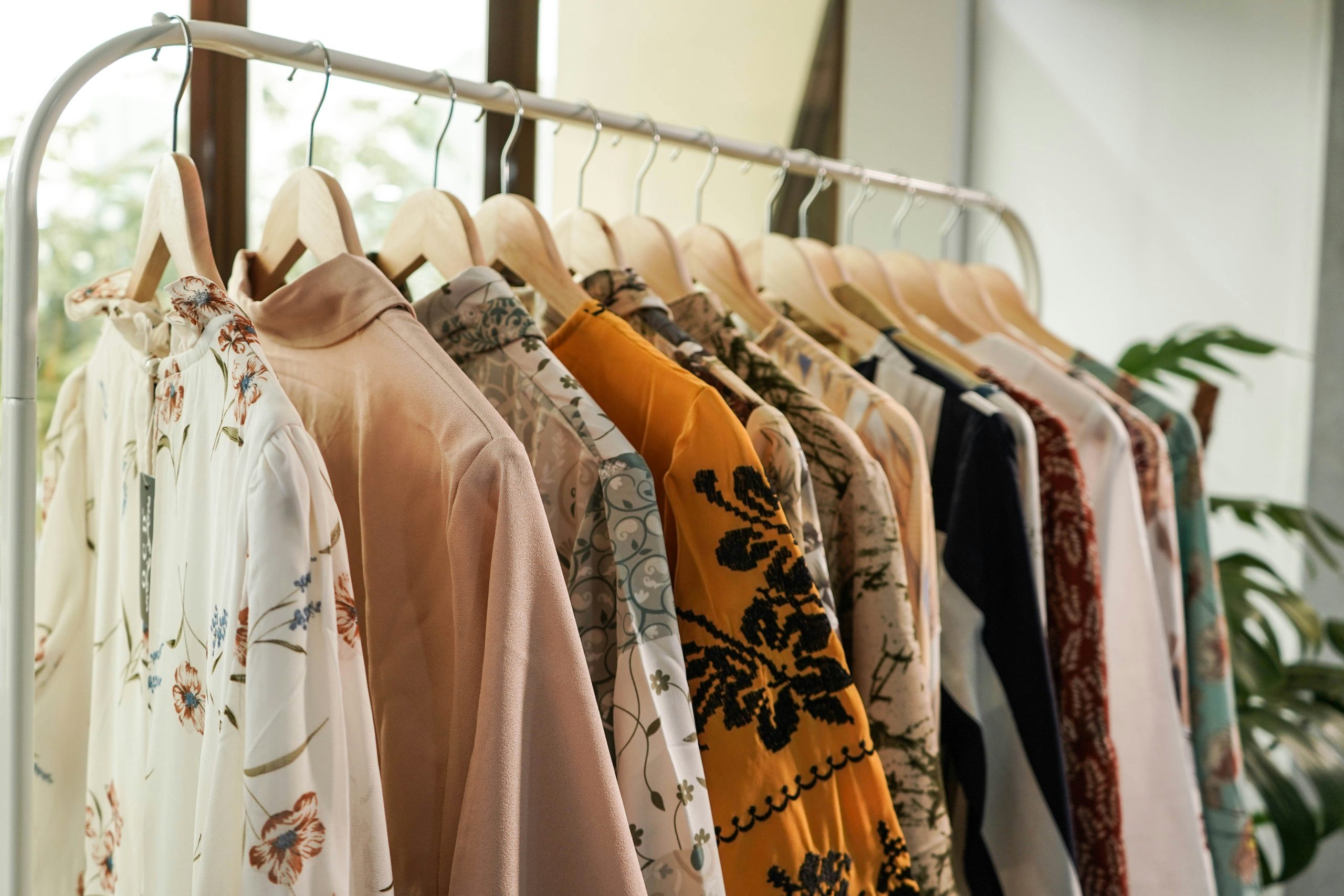 Curated designer clothing displayed in a boutique, reflecting Mosman's growing designer resale fashion scene.