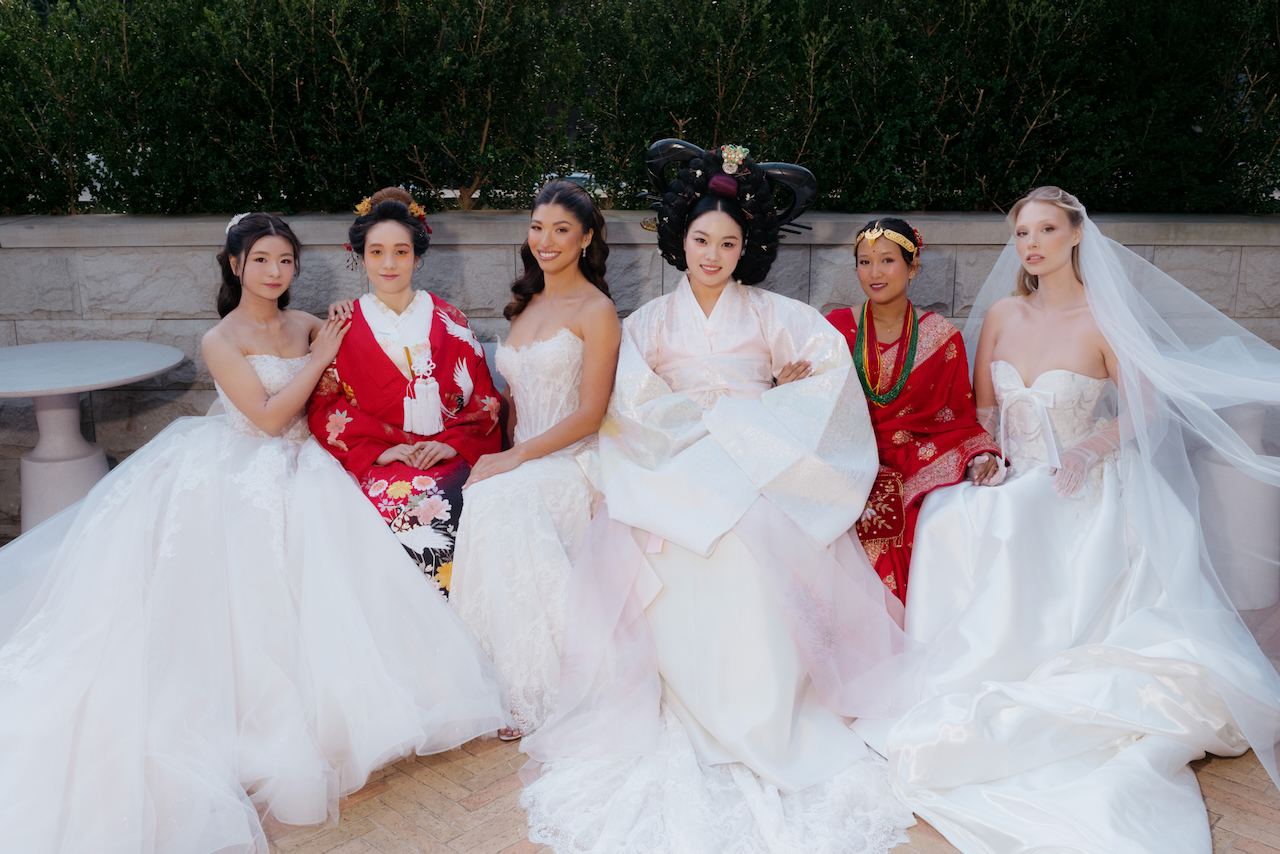 women in bridal gowns at mosman bridge magazine launch event