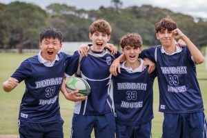 boys in reddam house uniform at a sporting field